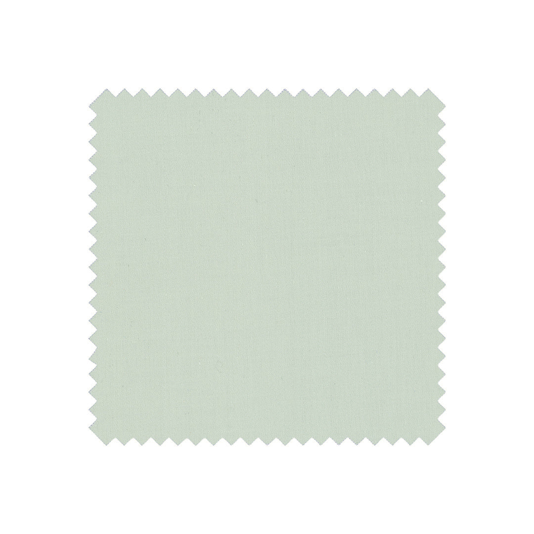 Light green fabric swatch on a white background