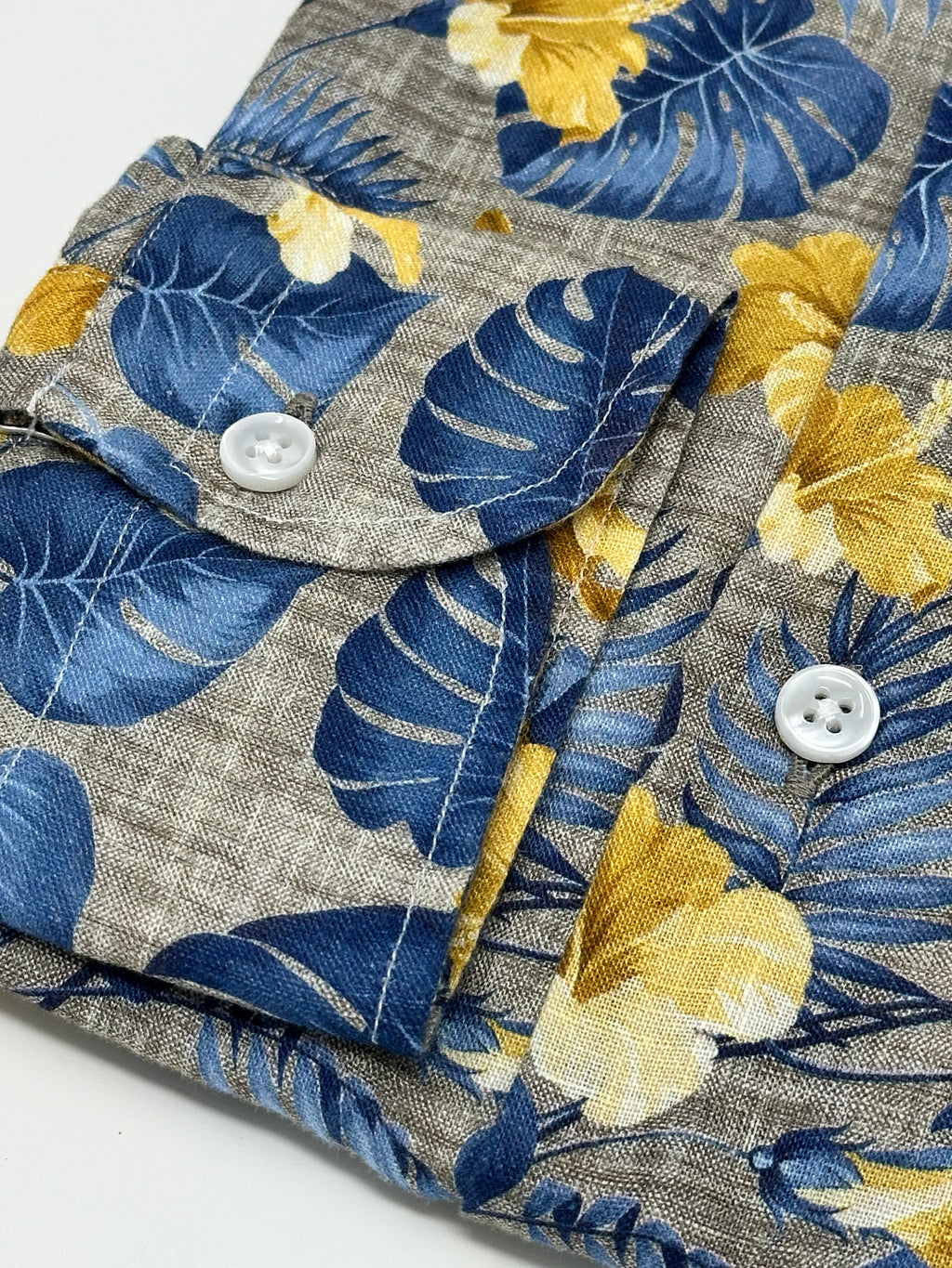 Men's tan linen blue and yellow floral print sport shirt. Shop stylish high-quality mens sport shirts by Ike Behar.