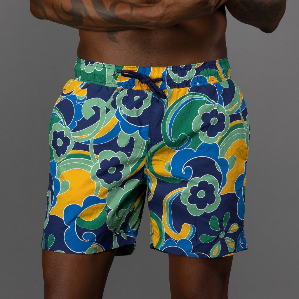 Men's Ultra-Marine Floral Swirl Print Swim Shorts. Shop stylish high-quality mens swim shorts set by Ike Behar.
