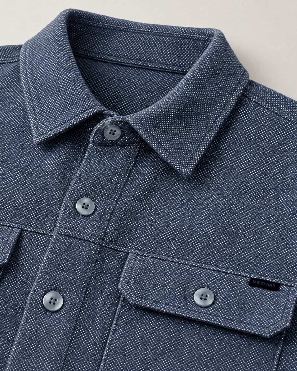 close up of denim hue knit shirt jacket