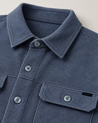 close up of denim hue knit shirt jacket