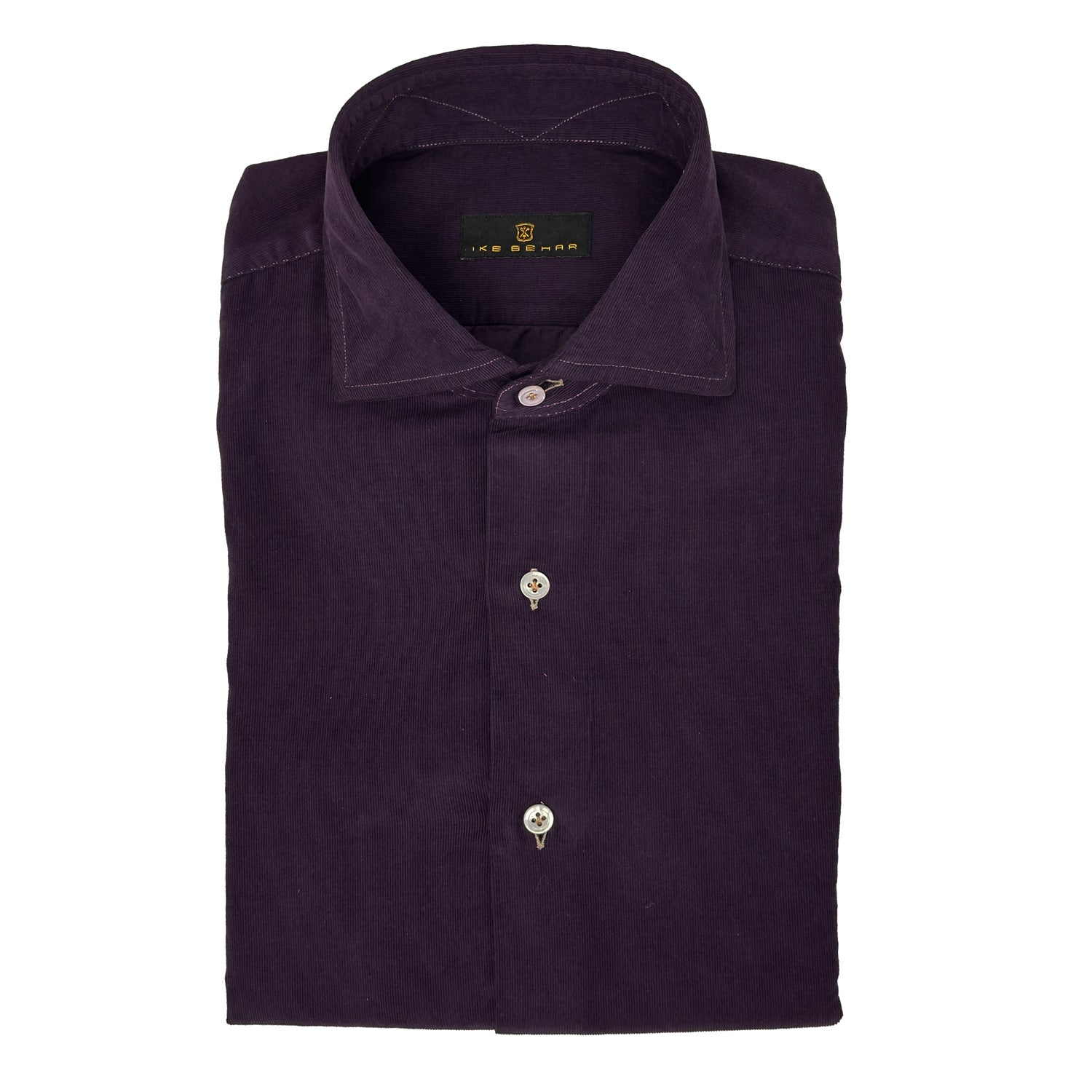 Folded dark purple shirt/plum shirt with a brand label on a white background