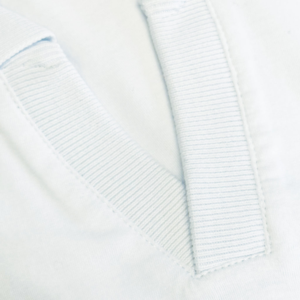 Men's white pima johnny collar polo T-shirt. Shop stylish high-quality mens polo t-shirt by Ike Behar.