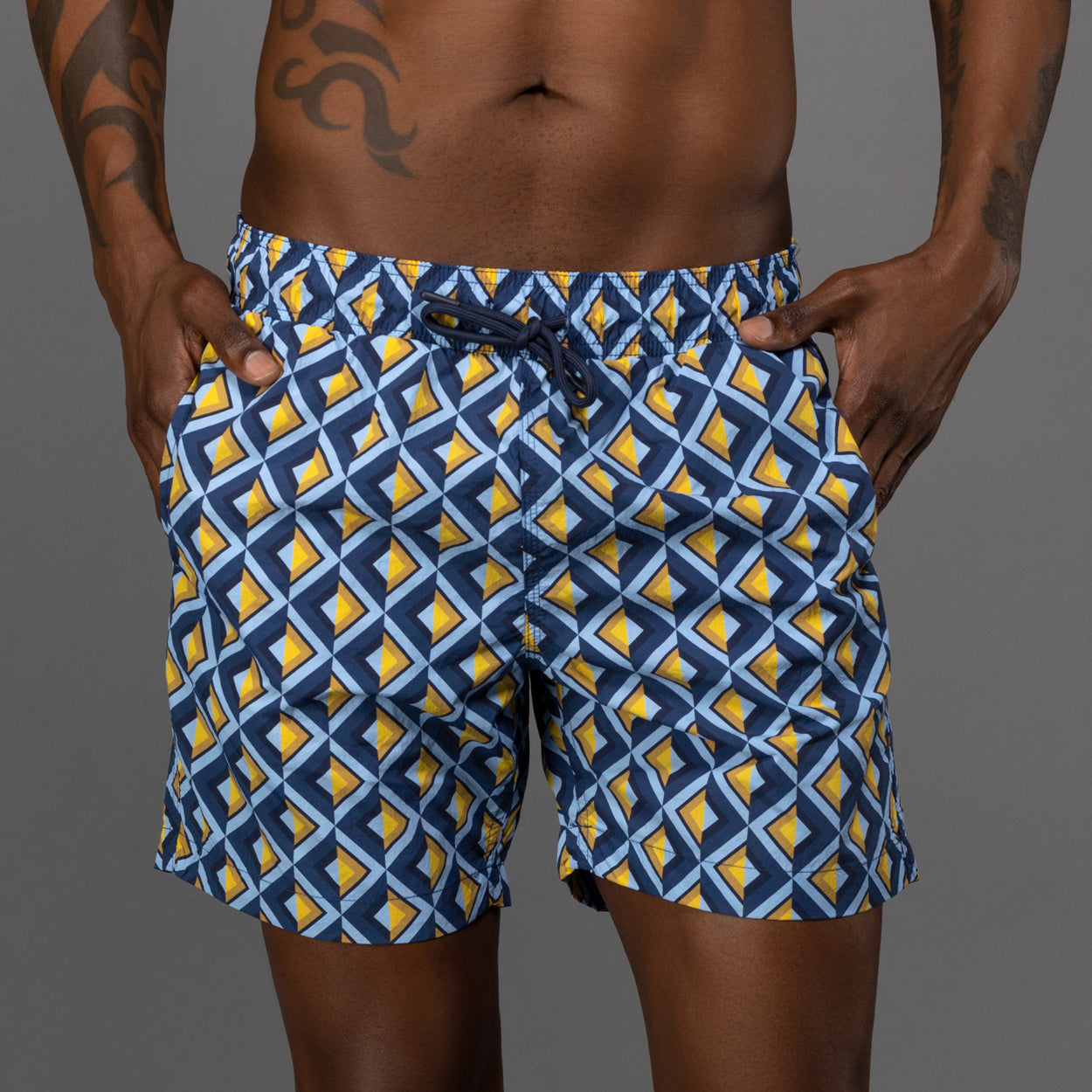 Men's diamond print in blue and yellow swim shorts by Ike Behar