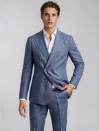 Man wearing a blue suit with a white shirt on a light gray background