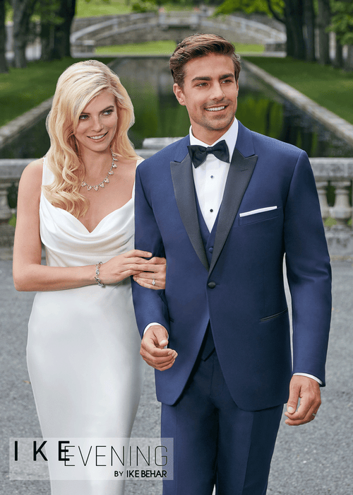 Men's navy tuxedo suit peak with black satin lapel. Shop stylish high-quality mens tuxedo suit by Ike Behar.